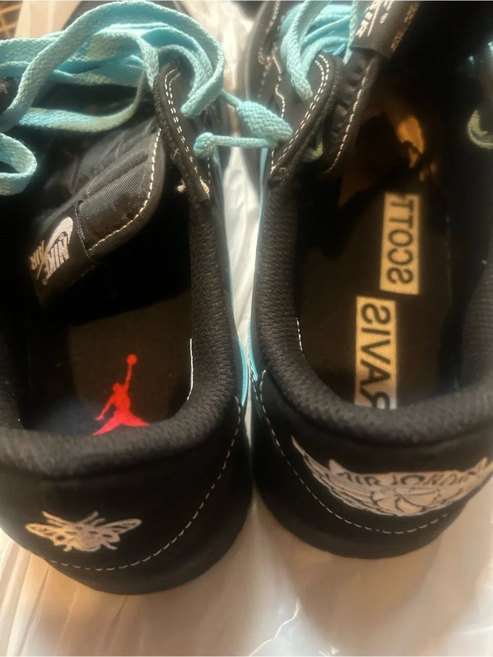 Nike Black Sneakers with Teal Accents